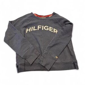 Heather Blue Vintage Tommy Hilfiger sweatshirt with metal emblem. #90s